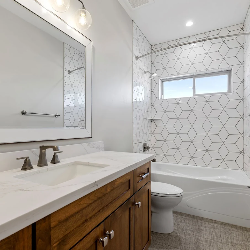 Beautiful bathroom remodel in Arizona with white tile shower walls