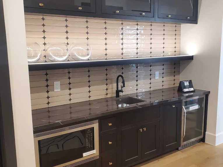 Kitchen in Prescott, AZ with black and white tile backsplash