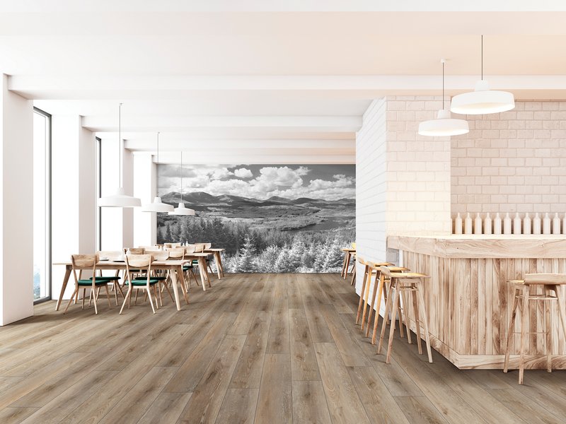 Barrett Floors Vinyl Flooring, Prescott AZ: Close-up of richly textured, medium-brown oak planks installed in a residential space.