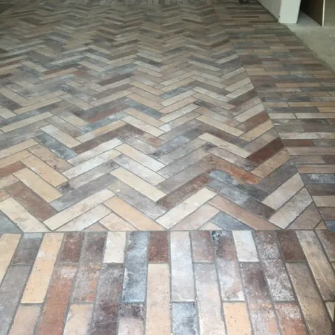 Rustic stone flooring by Barrett Floors