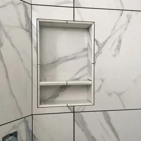 Marble tiles installed in a shower
