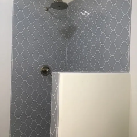 Glossy tile shower installation
