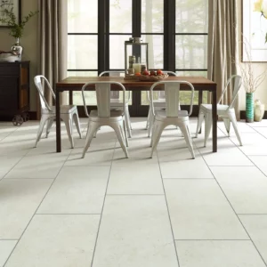 Shaw Floors Avorio large rectangular light beige tile in a dining room | Barrett Floors