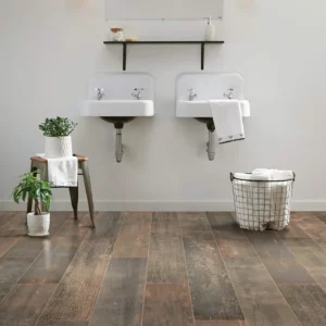 Shaw Floors tile with a dark, burned wood look, in a bathroom | Barrett Floors